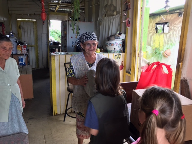 11-25-2017 The smile of gratitud from this woman was priceless as she received the bag of goods from our young team members